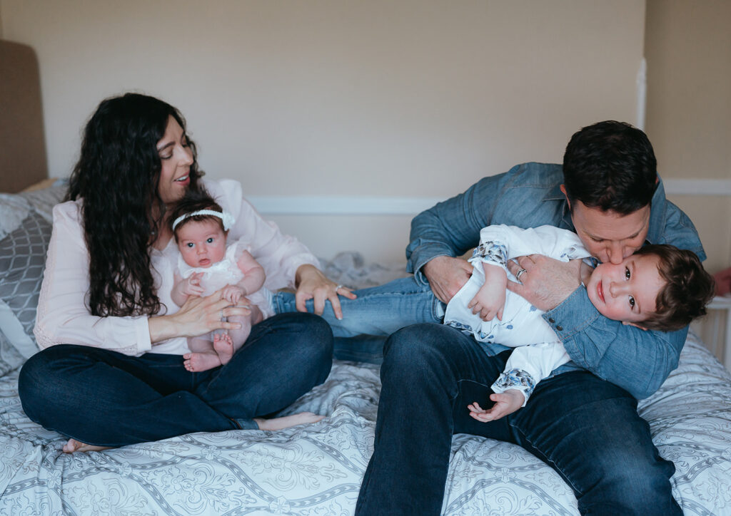 New York City in home newborn lifestyle photo session with toddler sibling.