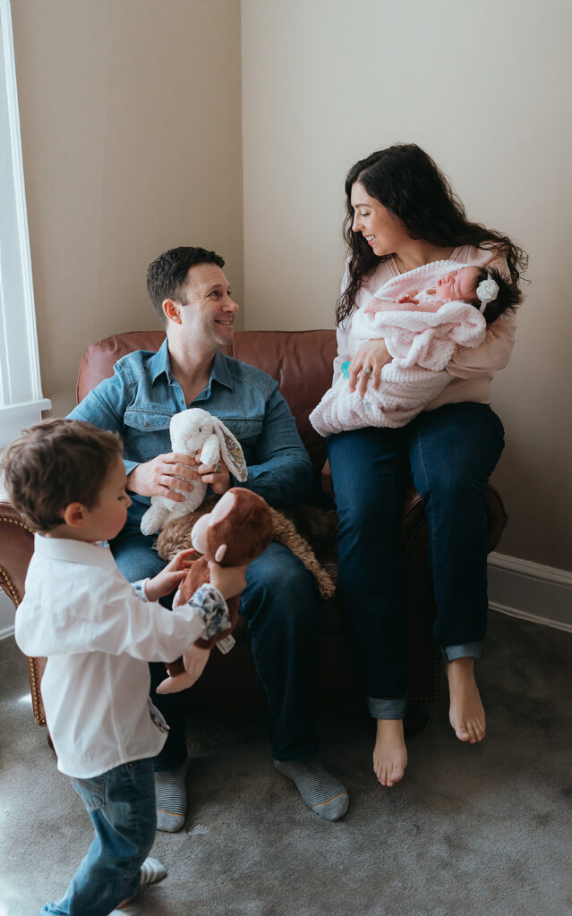 New York City in home newborn lifestyle photo session with toddler sibling.