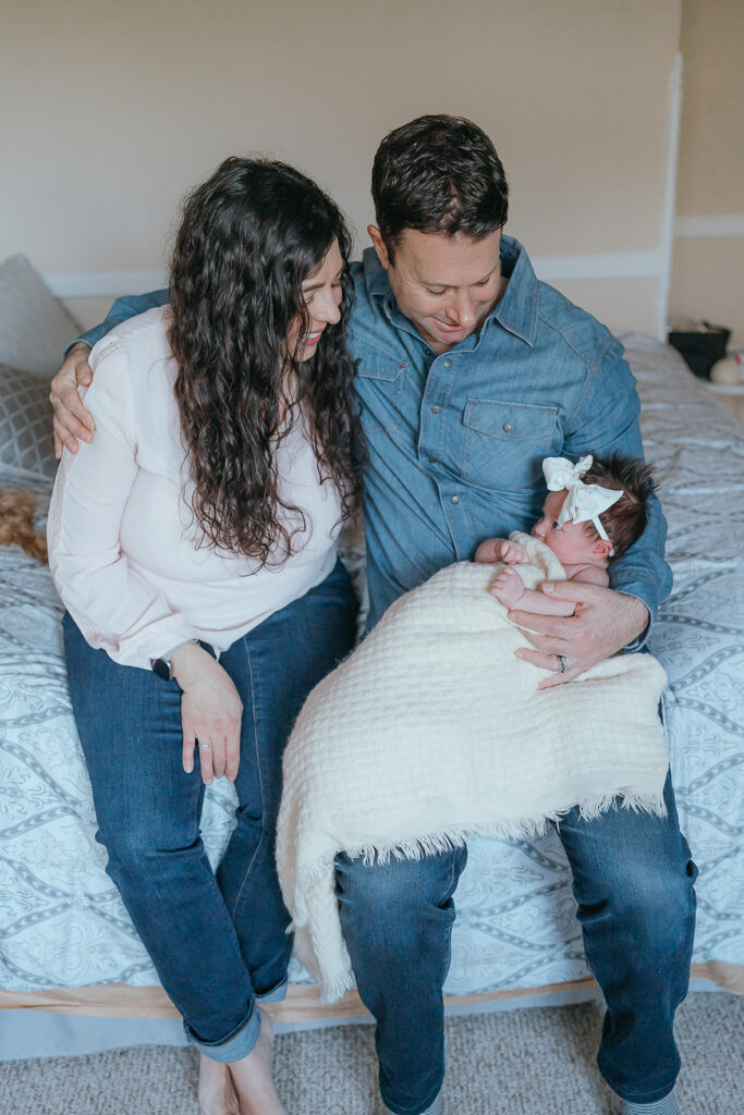 New York City in home newborn lifestyle photo session with toddler sibling and dog. 