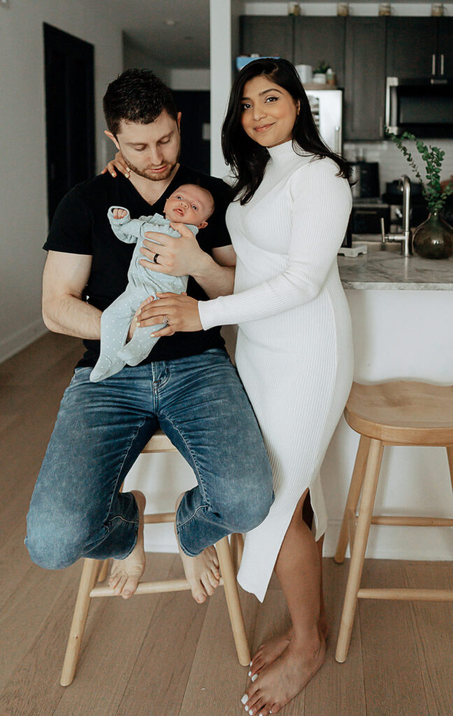 NYC in home family newborn session, family of three.