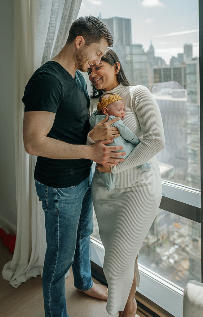 NYC in home family newborn session, family of three.